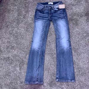 Slim Fit, low rise, tailored bootcut Buckle jeans